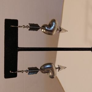 Silver tone heart and arrow pierced dangle earrings